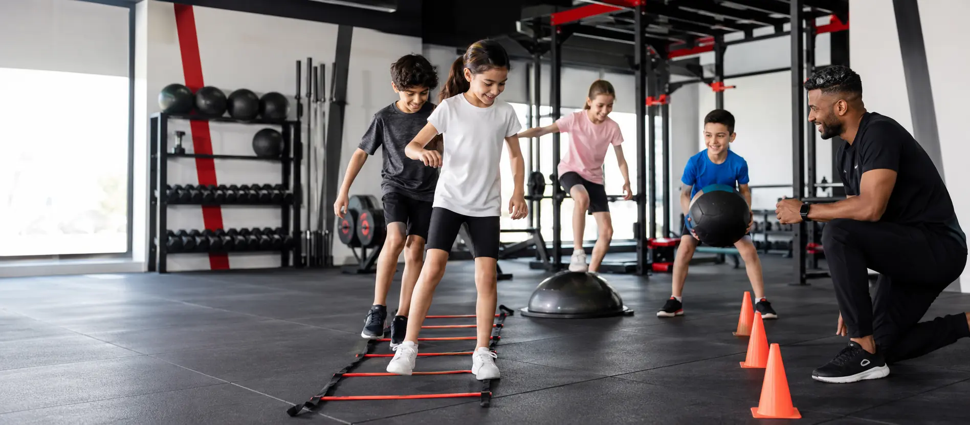 Teenagers comparing passive phone time with active supervised bootcamp training in Dubai